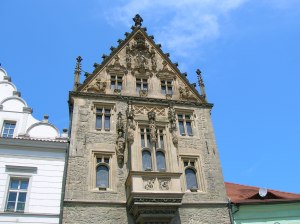 A closeup of the Gothic facade of The Stone House