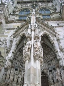 The rich ornamentation on the facade of the cathedral