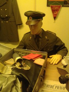 A figure of a border guard finding smuggled jewelry
